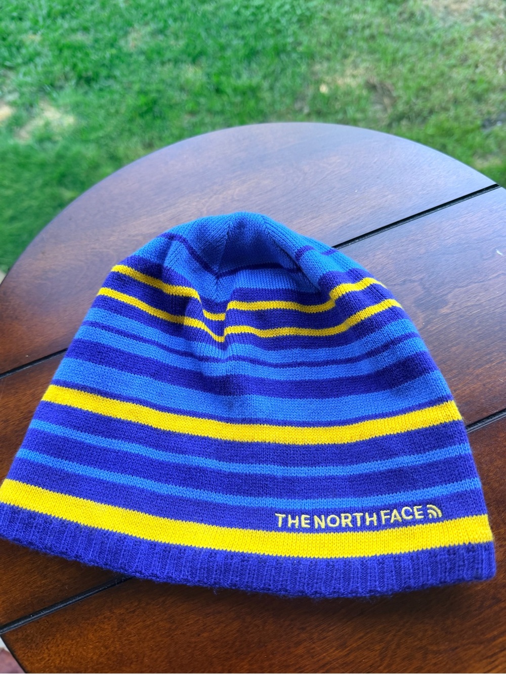 The North Face Striped Rocket Beanie Hat Blue and Yellow Adult One Size